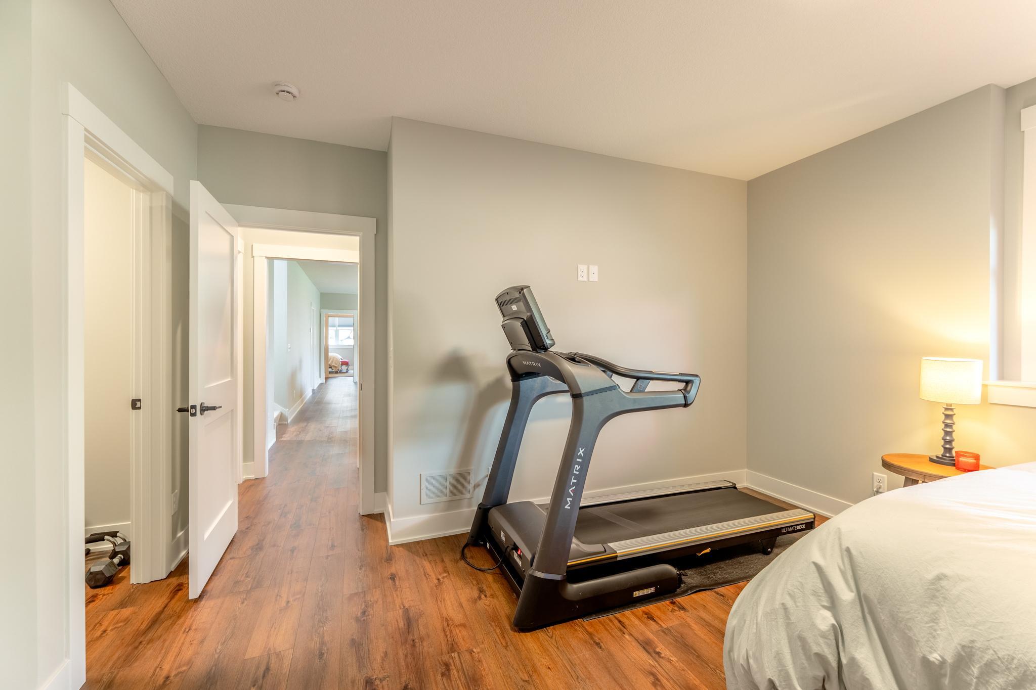 The bedroom has a walk in closet and is next to the second bathroom in the lower level.