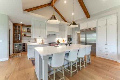 This kitchen is not only stunningly beautiful it is functional. Extra seating, Wolf and Sub Zero appliances and all the storage you need.
