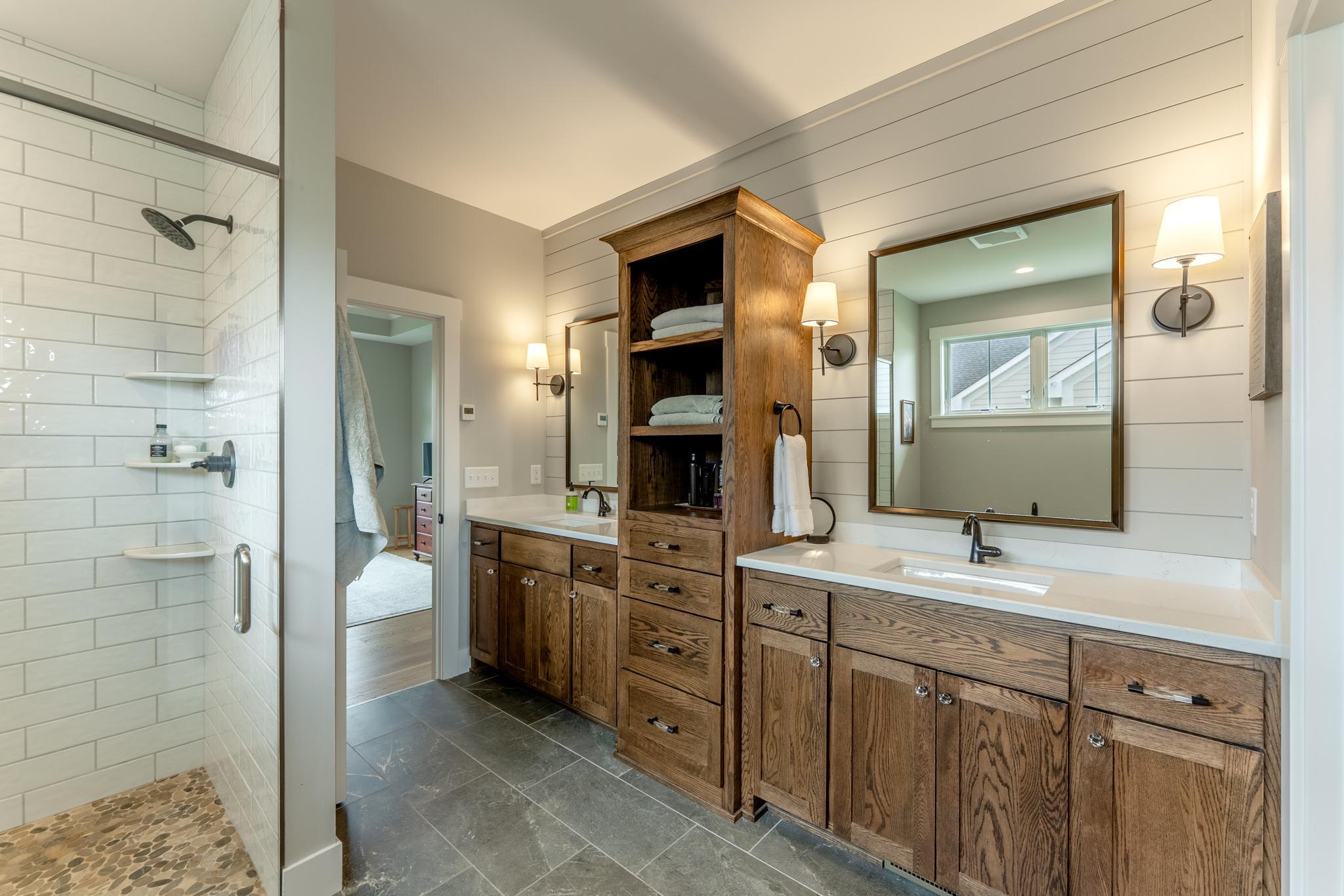 The primary ensuite bathroom is your own personal spa retreat with heated floors, walk in shower and soaking tub.