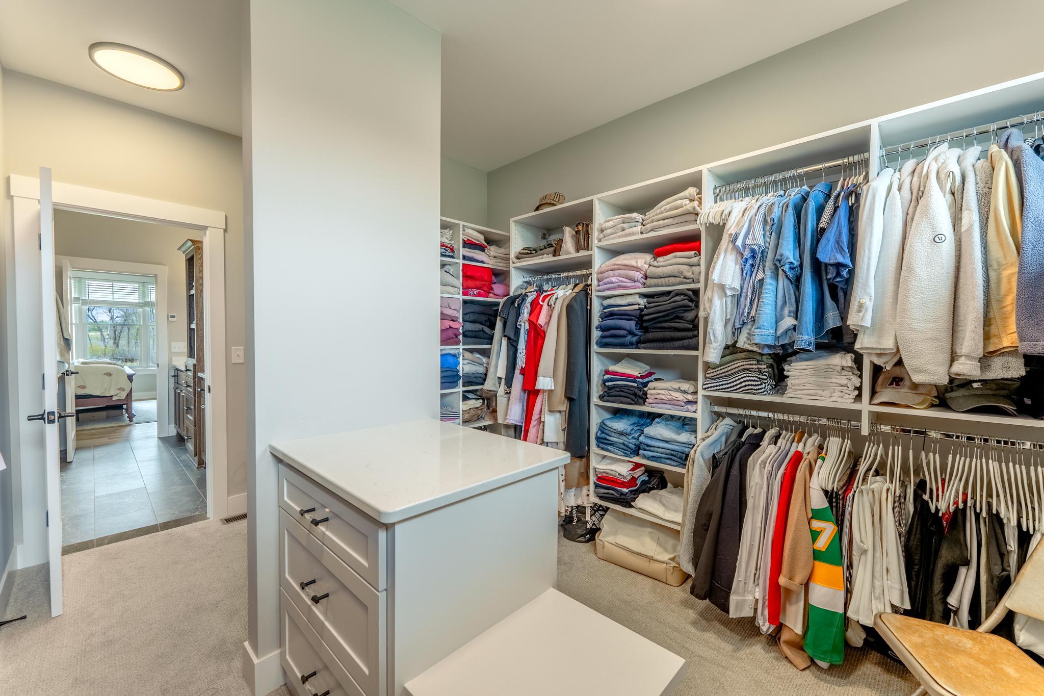Every inch intentionally designed — the custom primary walk-in closet delivers a boutique wardrobe experience with thoughtful built-ins tailored to the way you live.