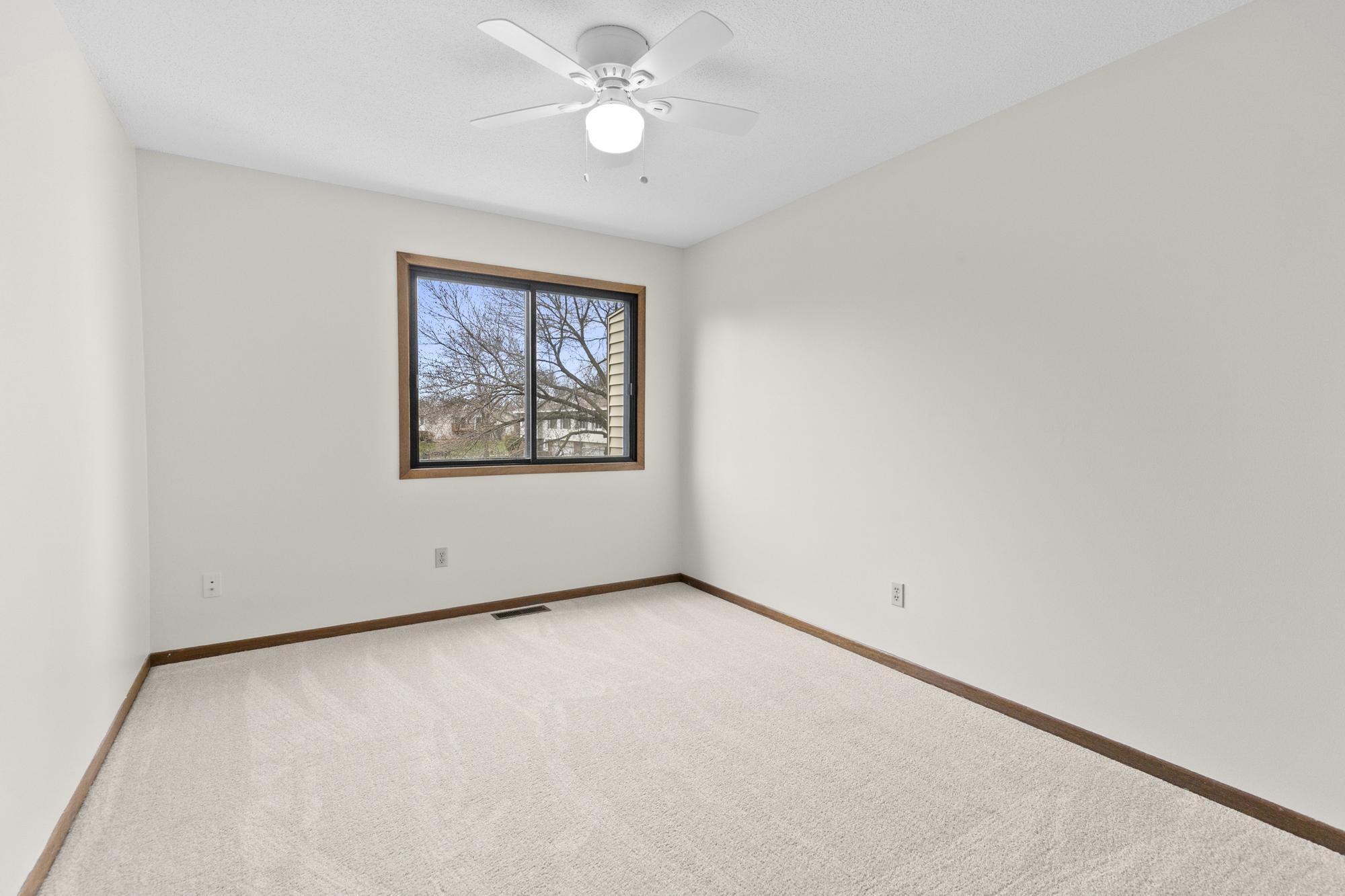 Both Bedrooms are sun-filled, and offer ceiling fans.