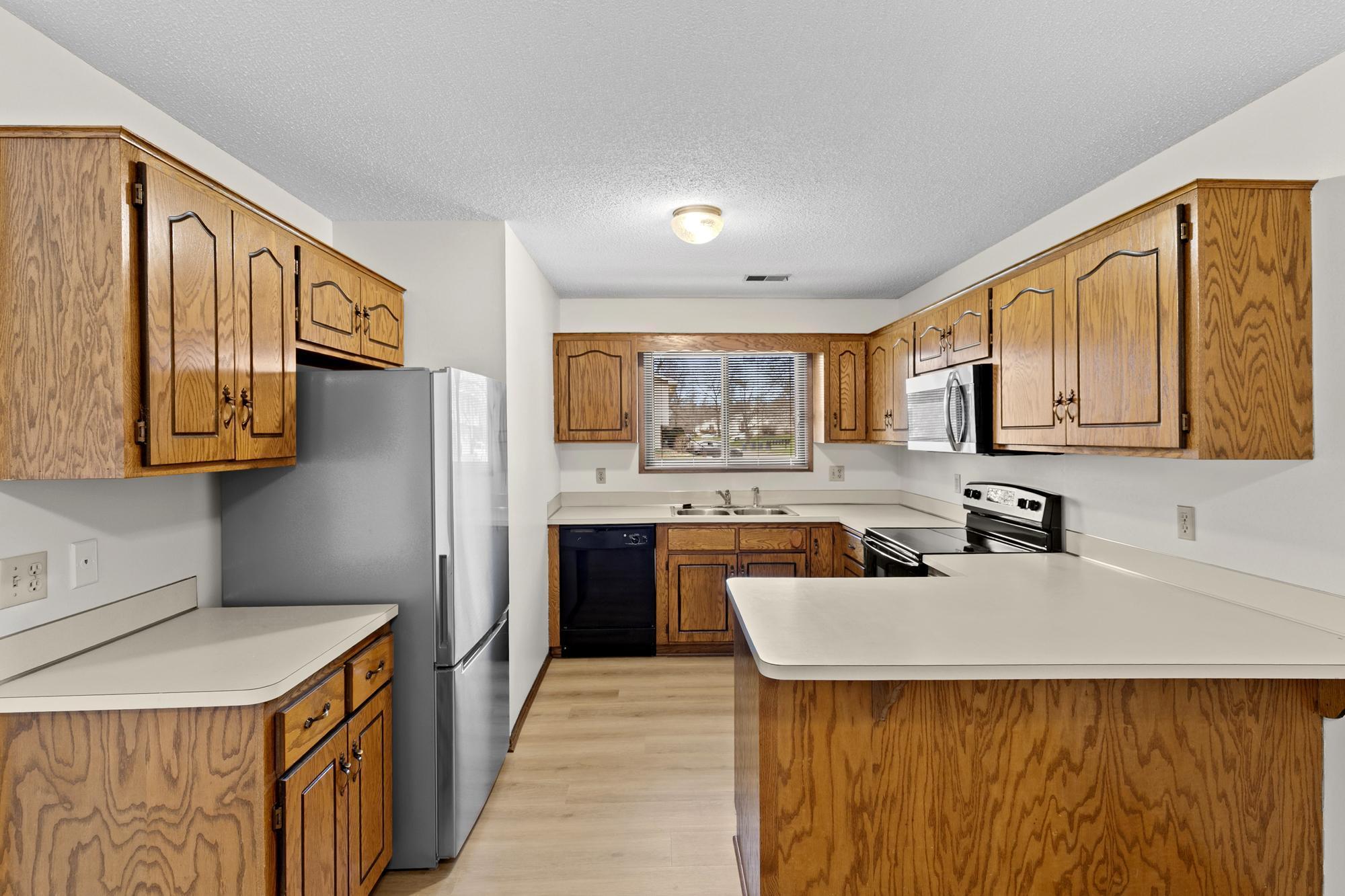 The Kitchen offers new stainless steel appliances.