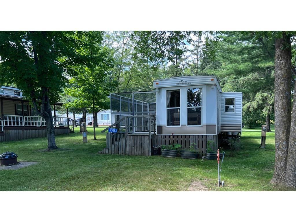 The park model is a 2003 Damon Breckenridge 844SB.