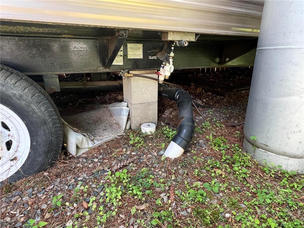 A shot of the access to water and septic connections.