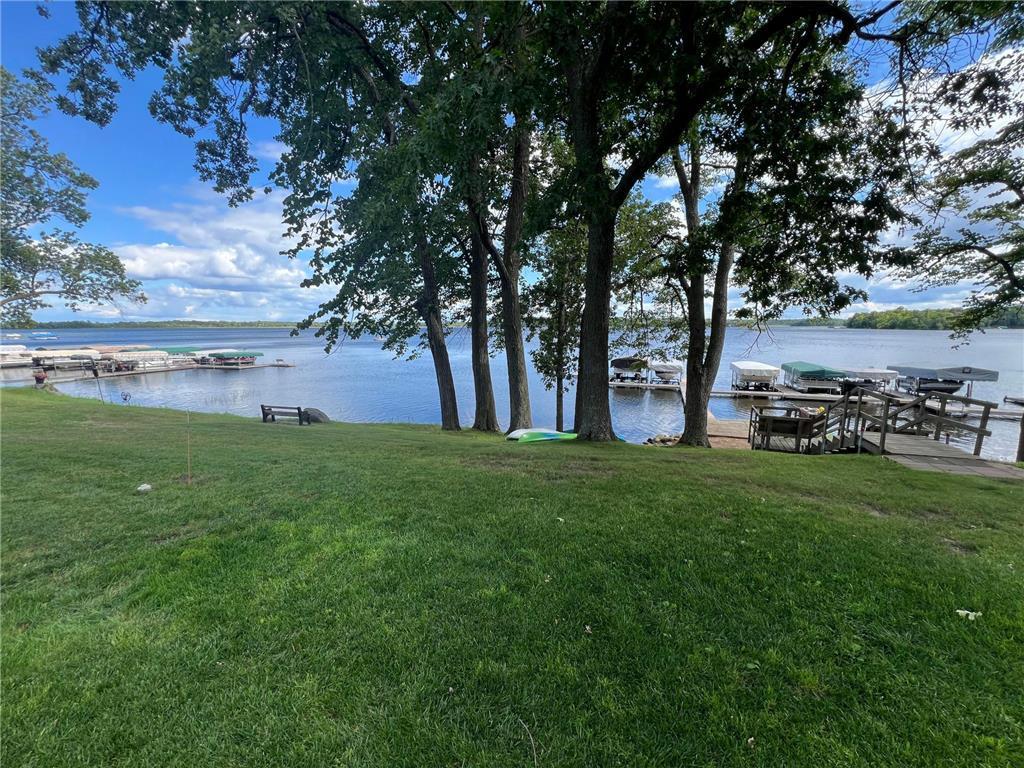 The purchase of this seasonal home comes with a boat slip!