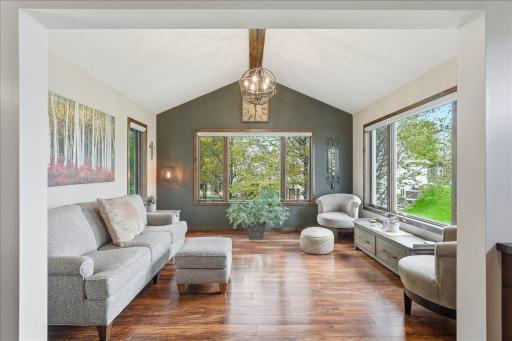 Natural light streams into your sunroom from the large picture windows.