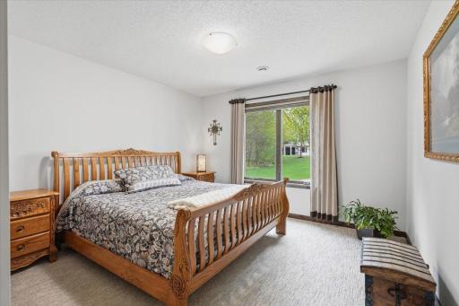 Lower level second bedroom with sliding glass doors.