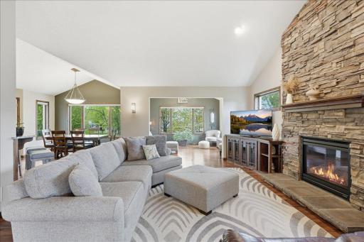 Open floor plan flows through the sunroom, kitchen and dining.