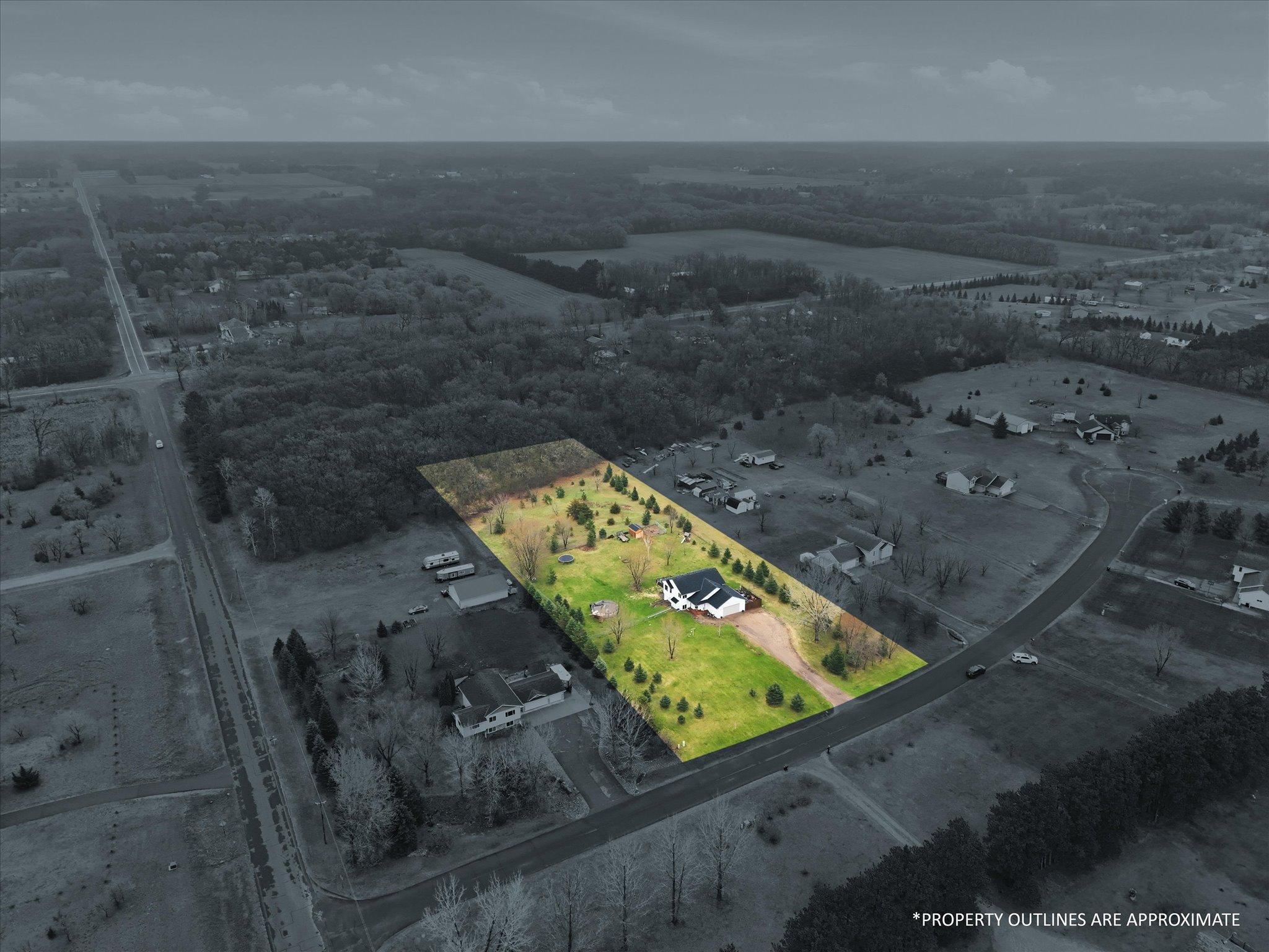 2.5-acre property with a spacious, open yard and mature trees