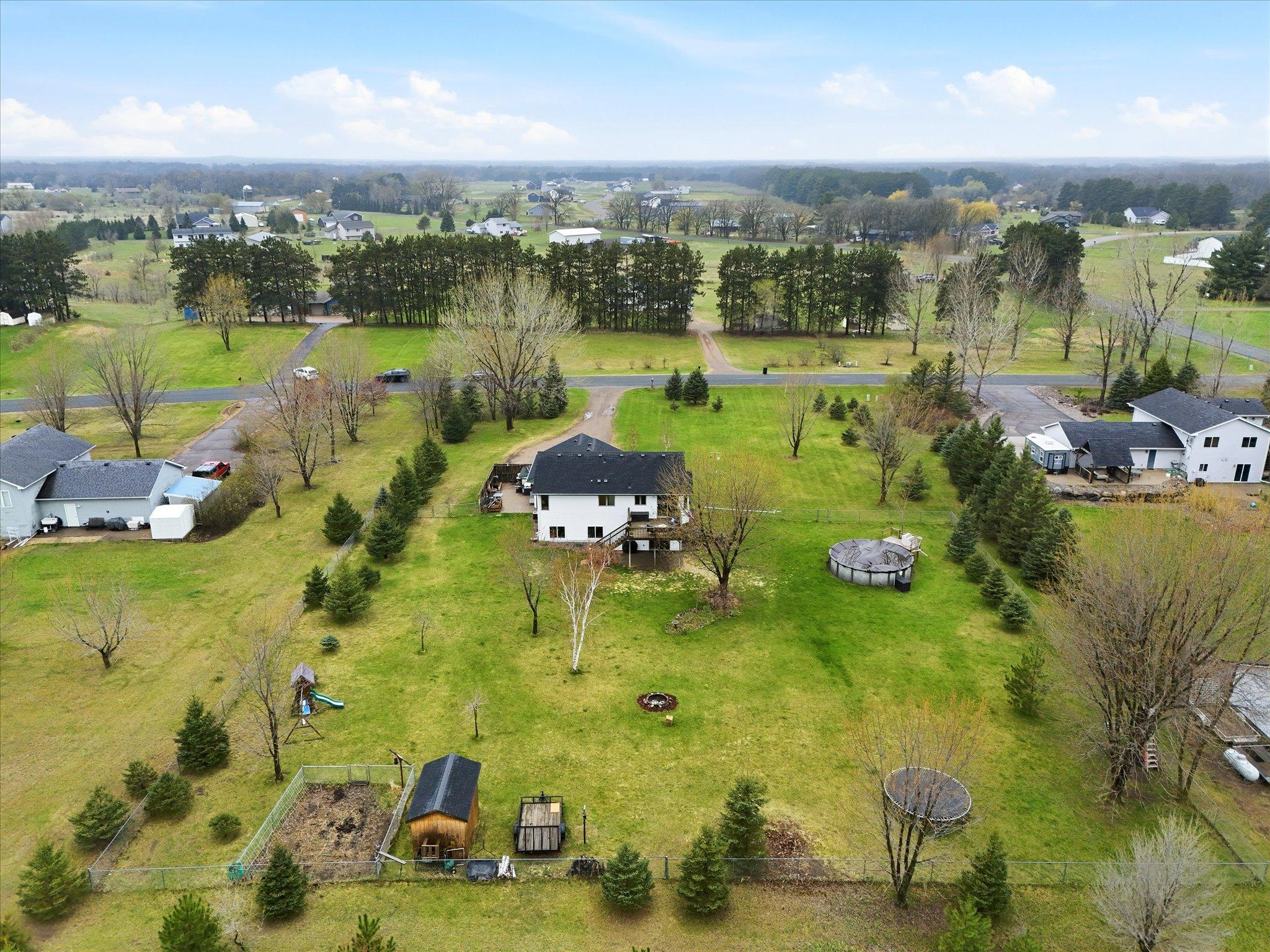 Fenced backyard adds a defined outdoor space