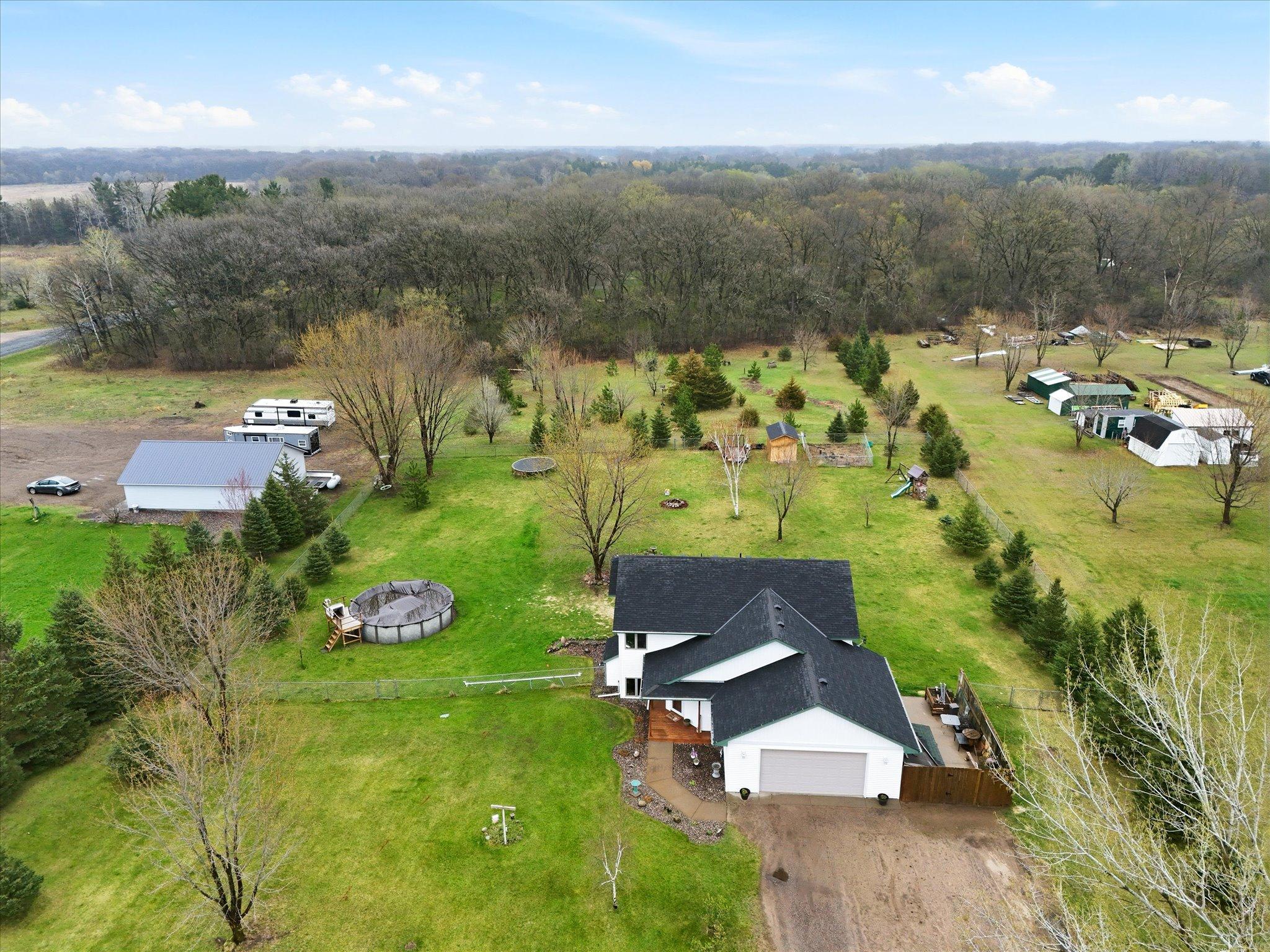 Additional fenced concrete slab, ideal for extra parking or storage