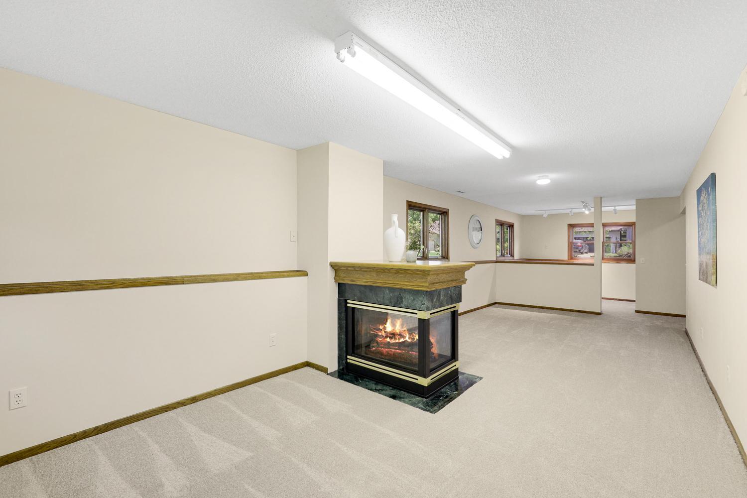 Large recreation room. New carpet and fresh paint throughout the home.