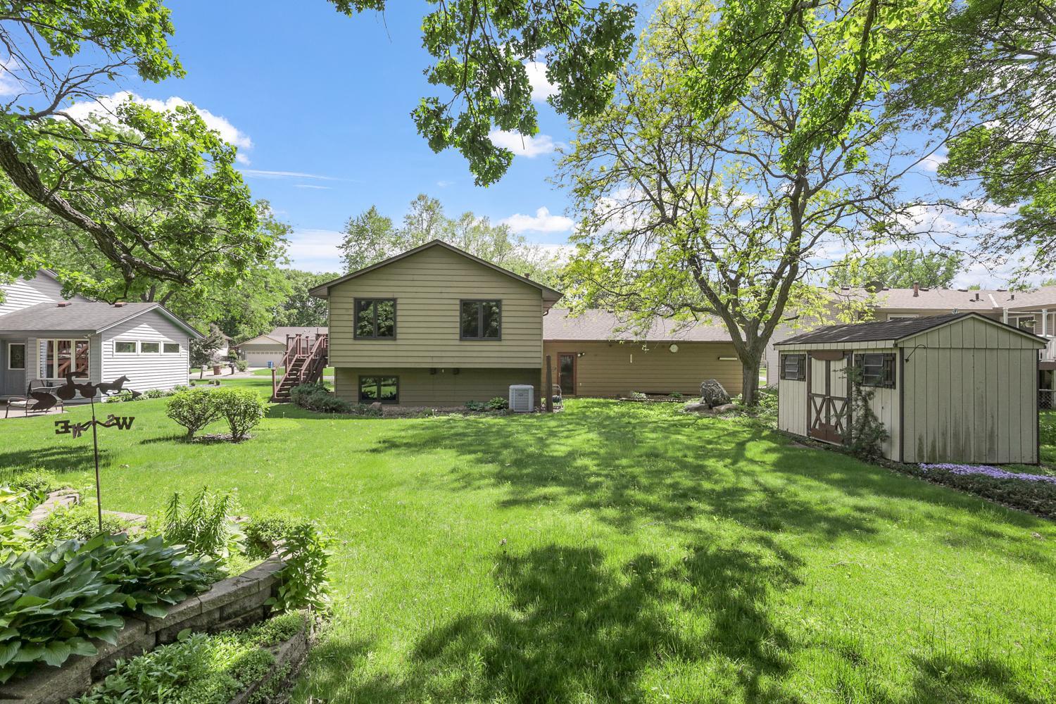 Large flat backyard. Storage buildings.