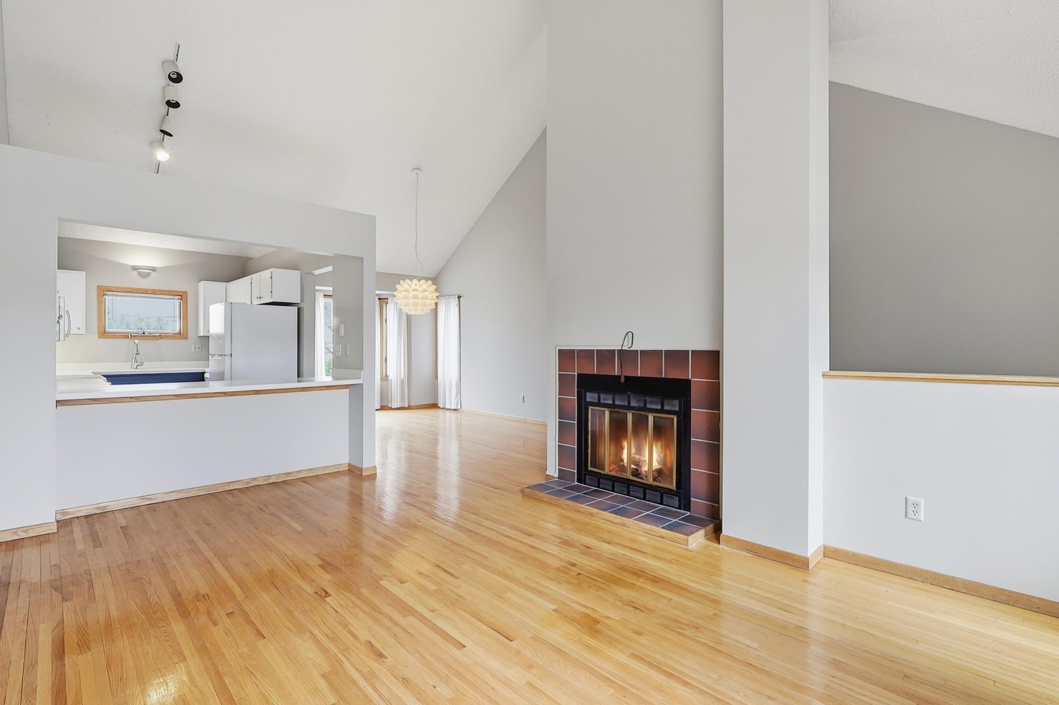 Gleaming hardwood floors and a wood burning fireplace.