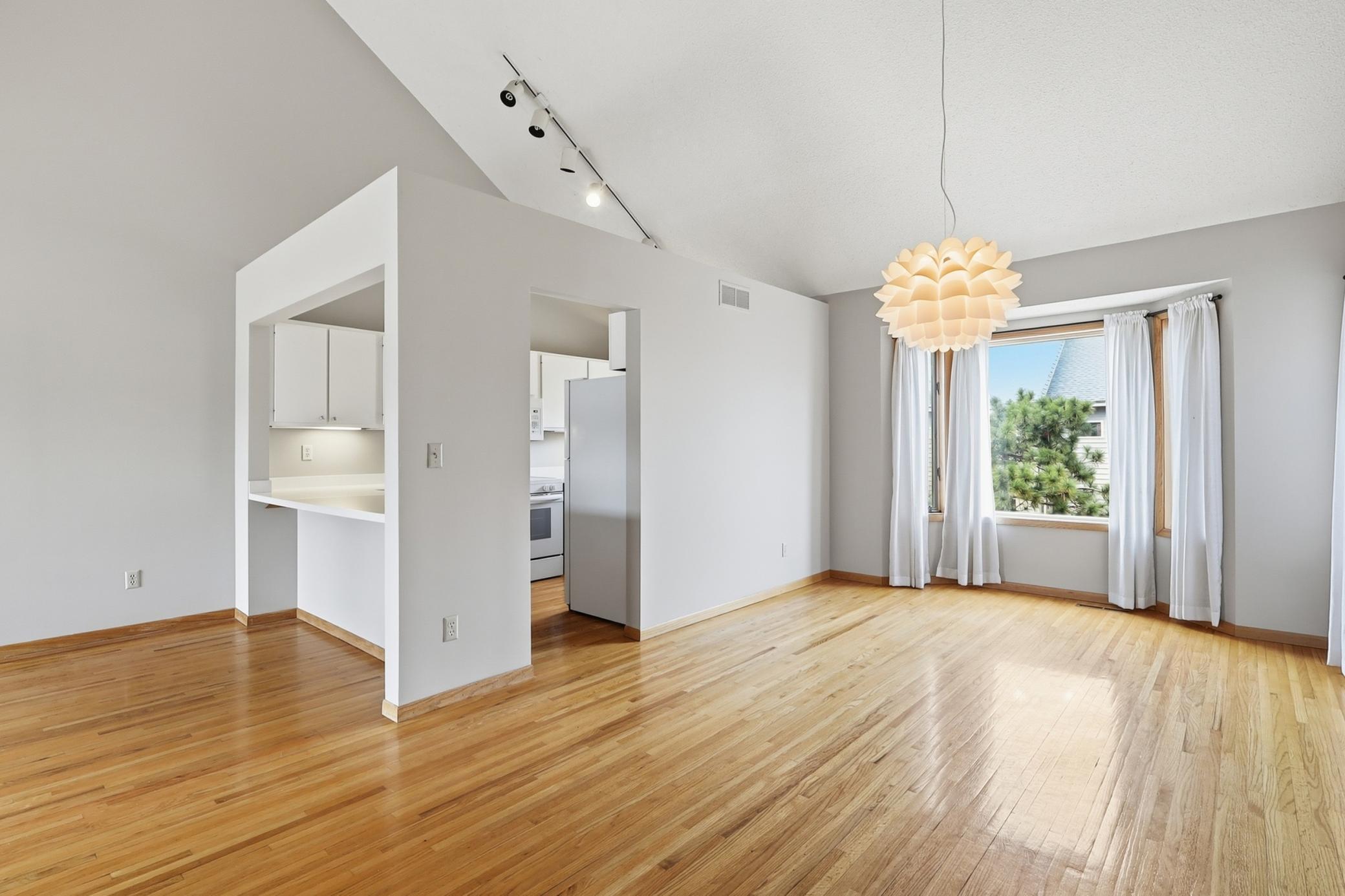 Open kitchen, formal dining and a breakfast bar.