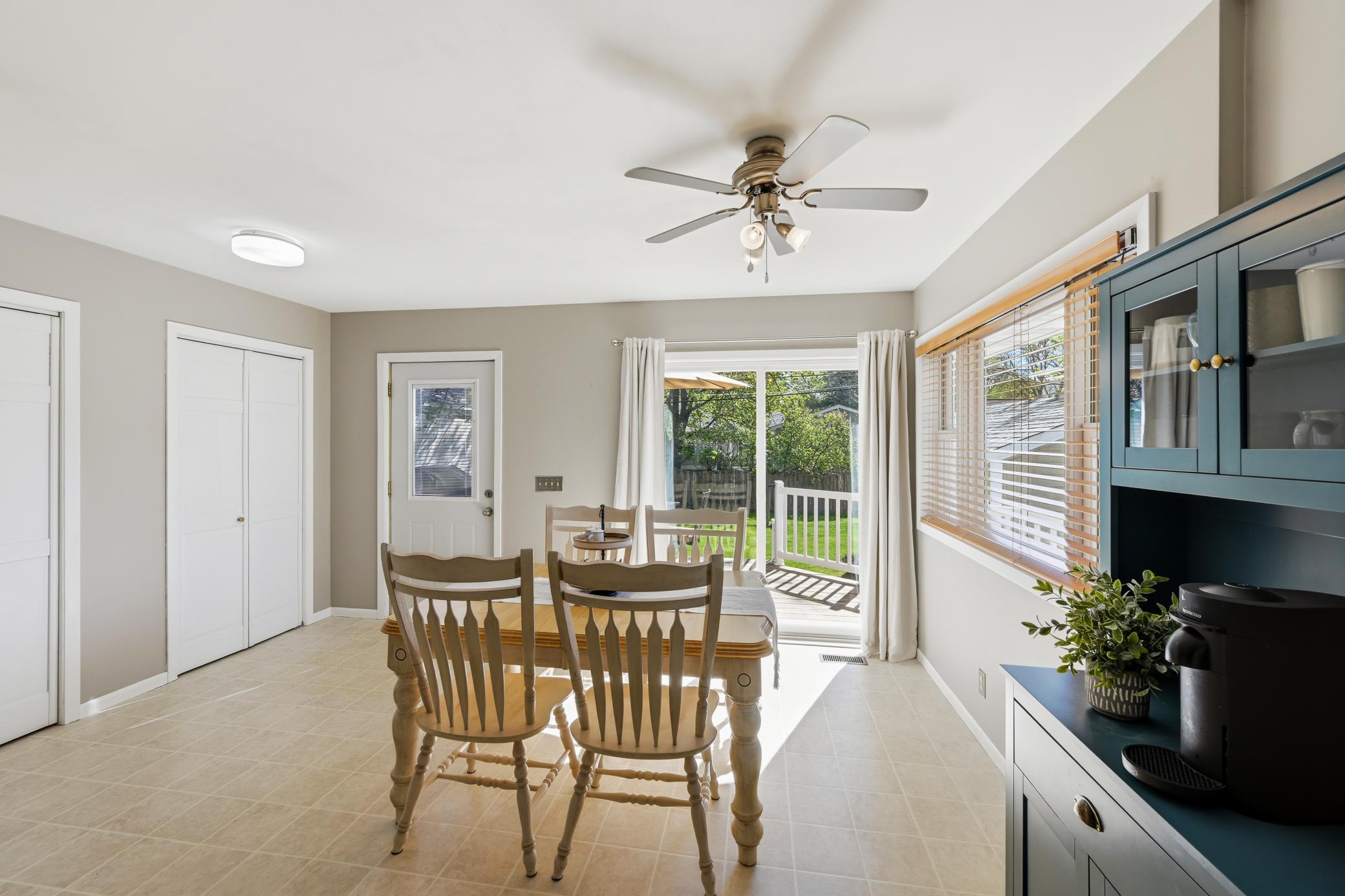 The large eat-in kitchen has room for guests to enjoy a home cooked meal.