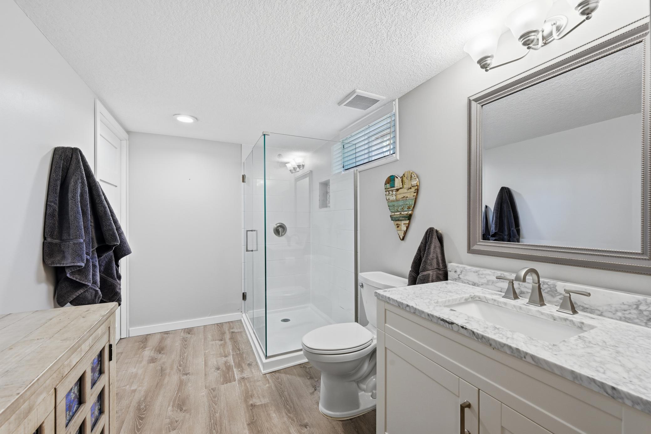 3/4 updated lower level bathroom.