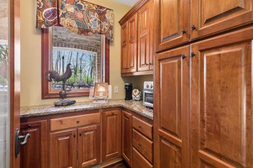 Designer pantry with views of the side yard