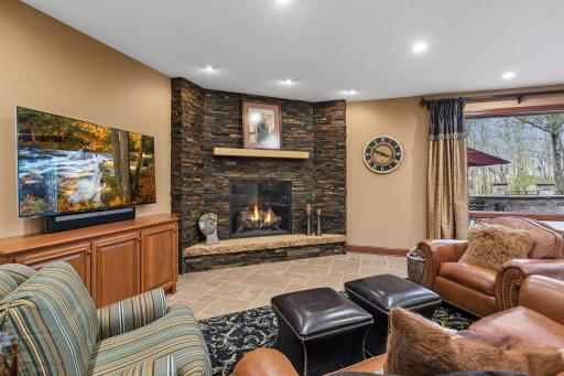 Expansive family room with stone fireplace