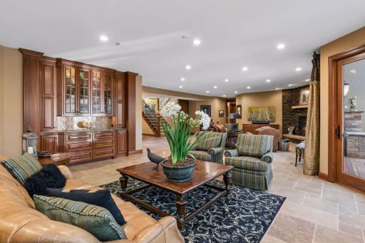 Circular seating alcove with built-in granite-topped cabinetry