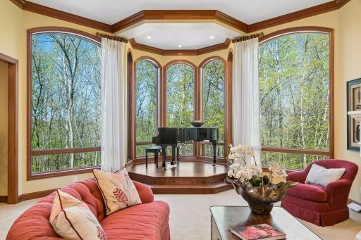 Elevated turret space framed by expansive windows