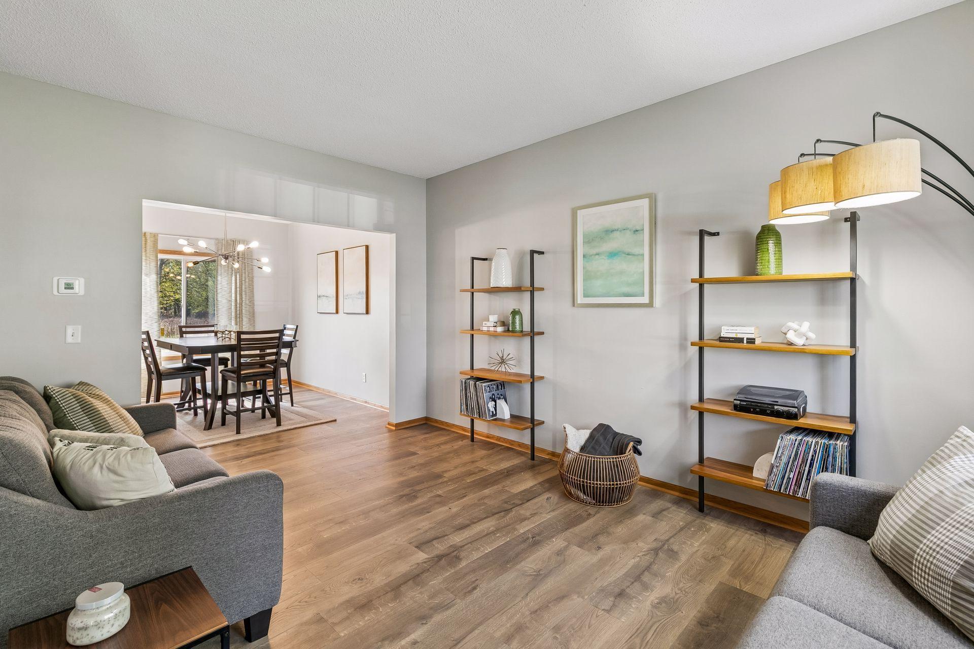 The formal living room flows seamlessly into the formal dining room.