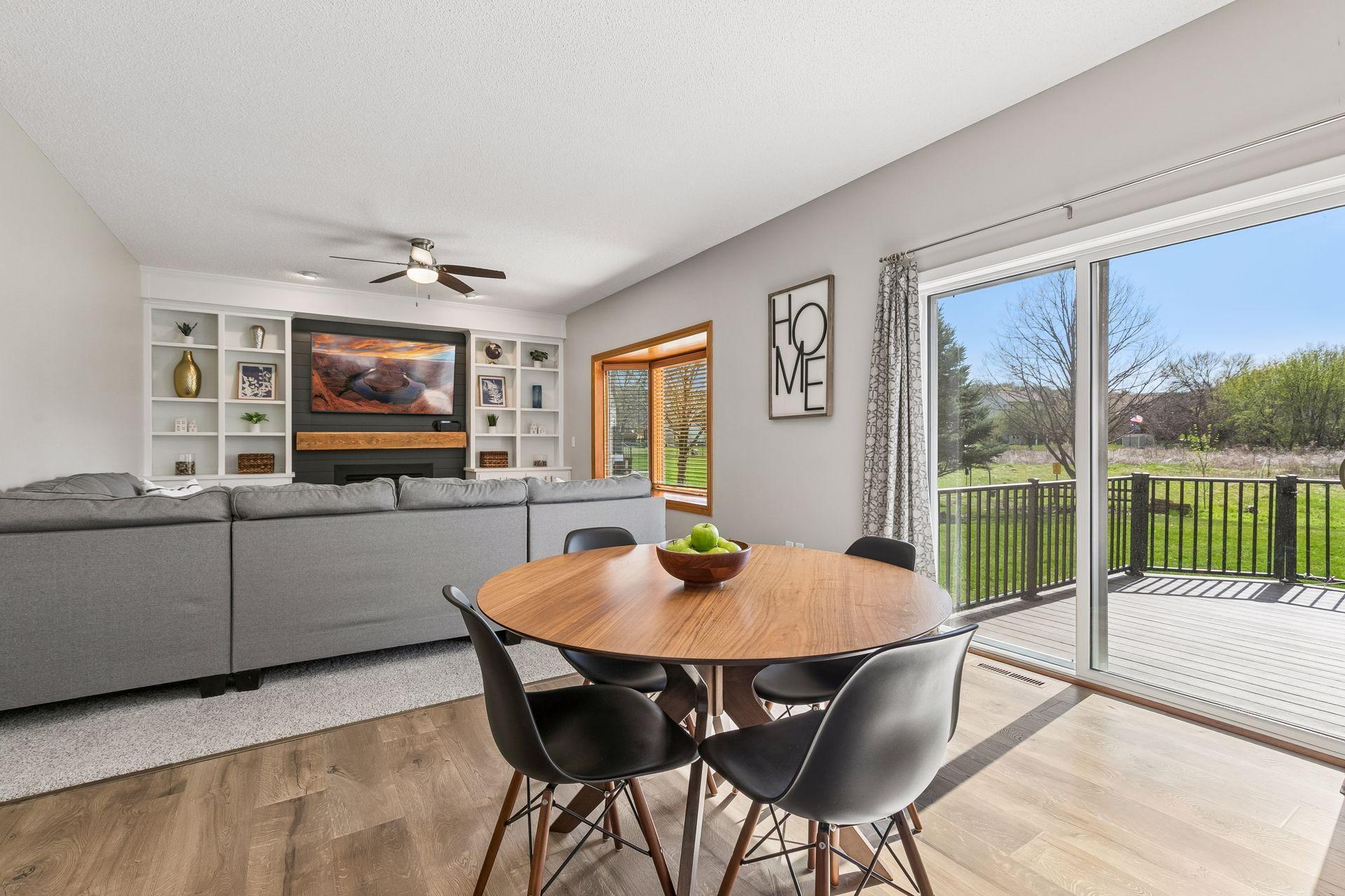 The informal dining area, with a sliding door that opens to the deck, is the perfect place to relax and take in the views. Amazing natural sunlight fills this room.