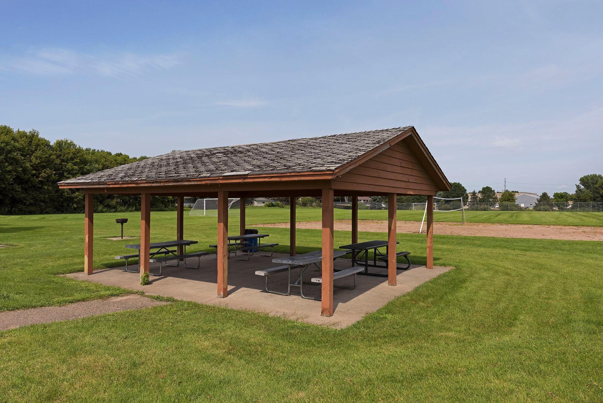 Schroeders Acres Park - Park pavilion providing shaded seating and space to gather outdoors. Plus sand volleyball court, soccer fields, and more.