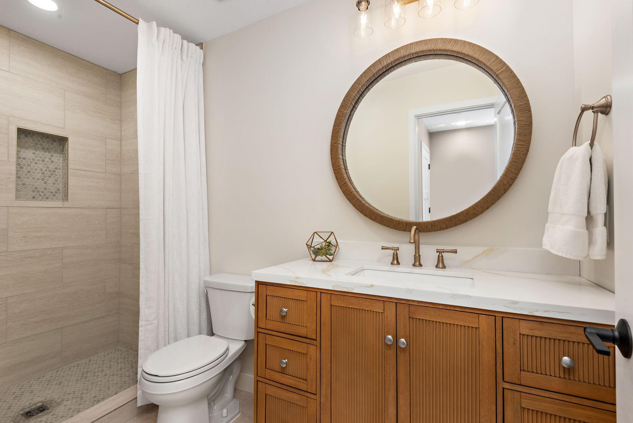 LL 3/4 bath with in-floor heat & stunning tiled shower