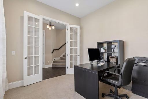 French doors close it off for private work meetings.
