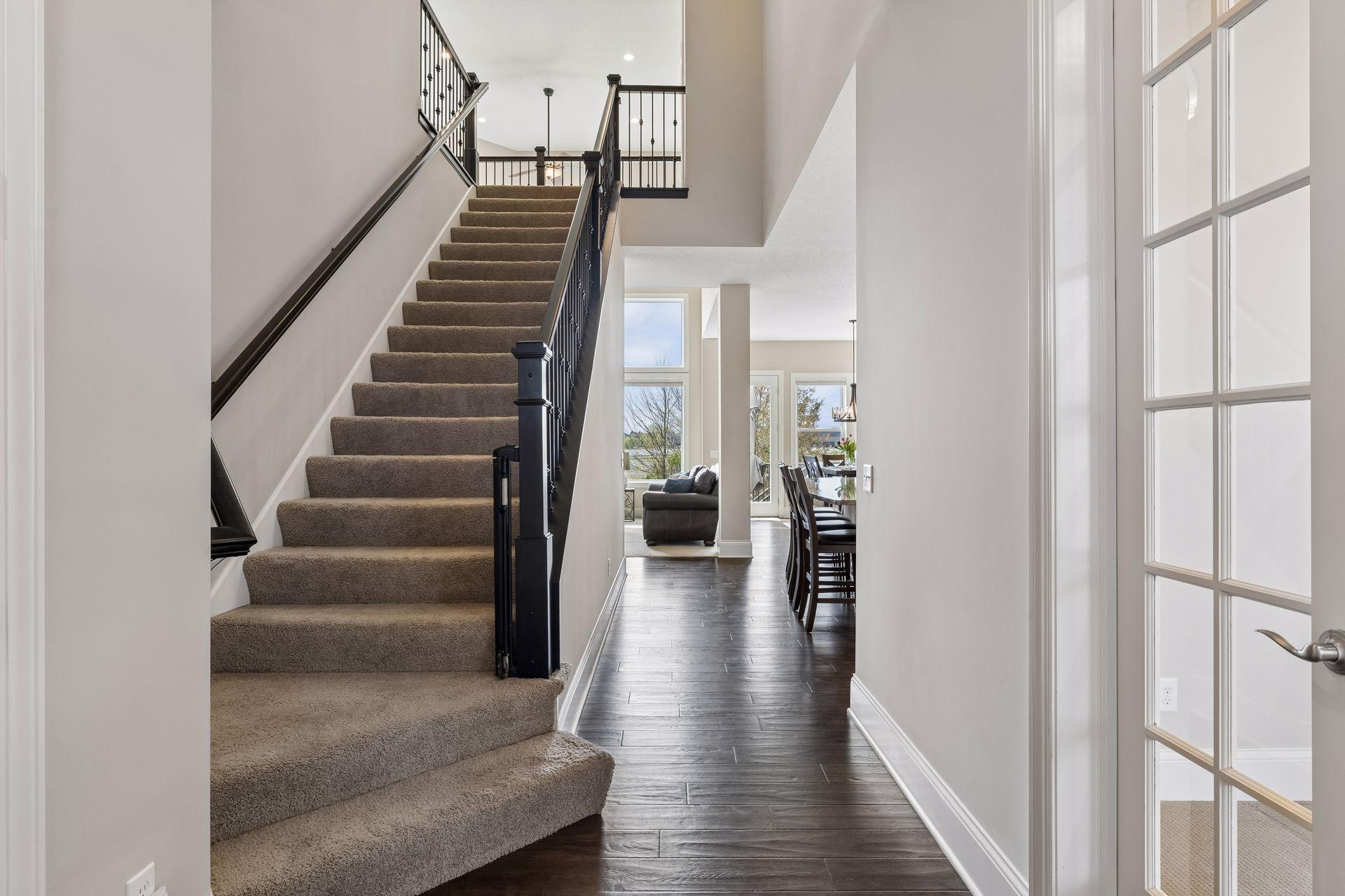 A most inviting WELCOME upon entering this home with engineered hardwood flooring.