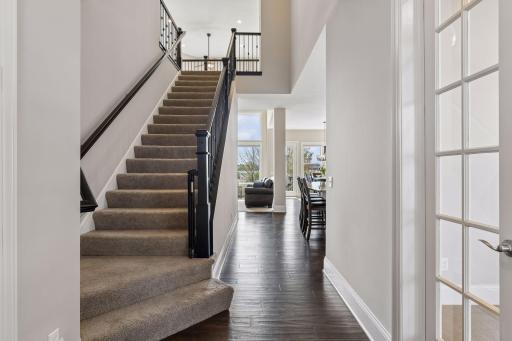 A most inviting WELCOME upon entering this home with engineered hardwood flooring.