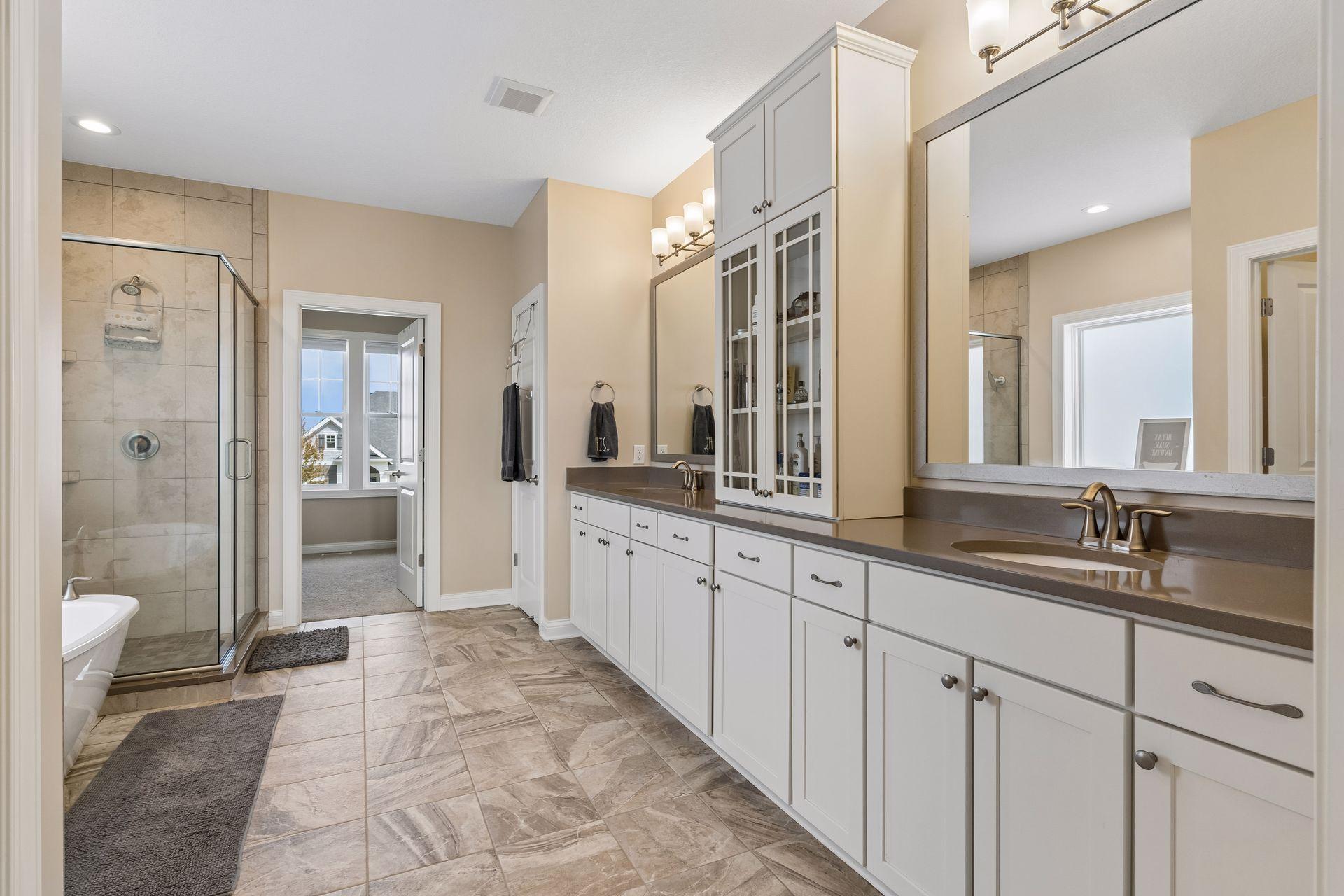 Heated bathroom floors. Oh so nice! Double sinks.