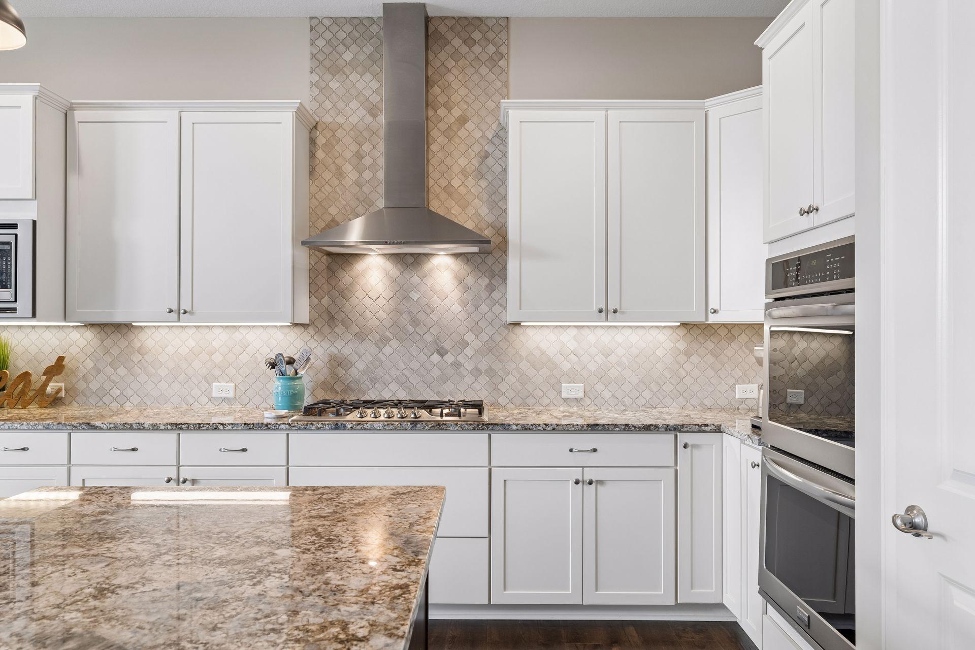 Again the details are shown off in the kitchen. Soft close cabinets and reverse osmosis. Loads of storage. And more counter area for multiple chefs in the kitchen.