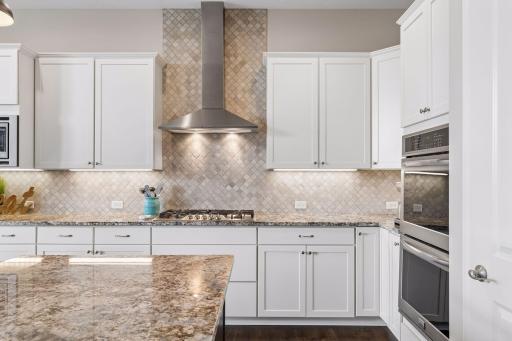 Again the details are shown off in the kitchen. Soft close cabinets and reverse osmosis. Loads of storage. And more counter area for multiple chefs in the kitchen.