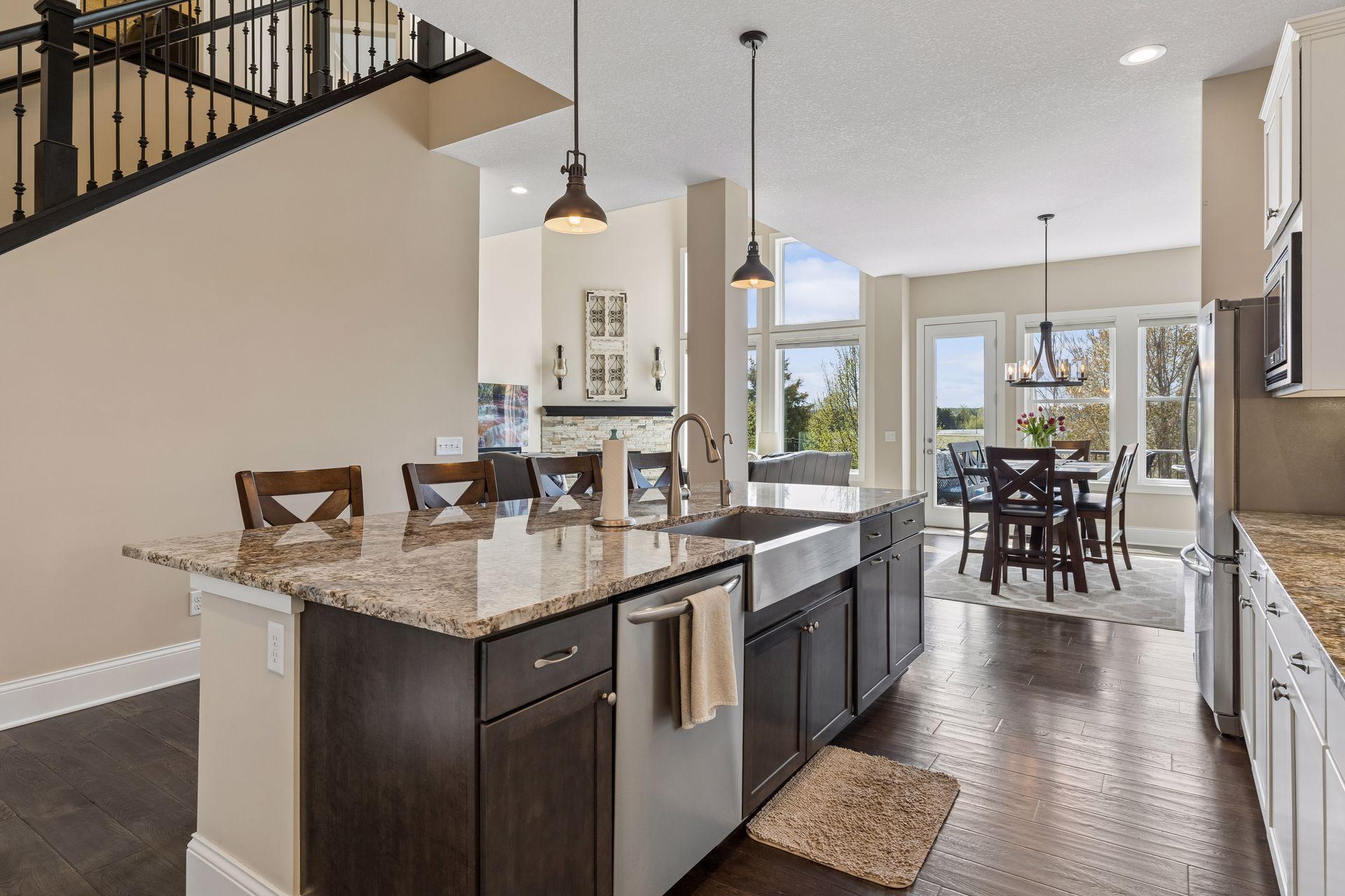 From the kitchen is the open floor plan to the dining room and living room.