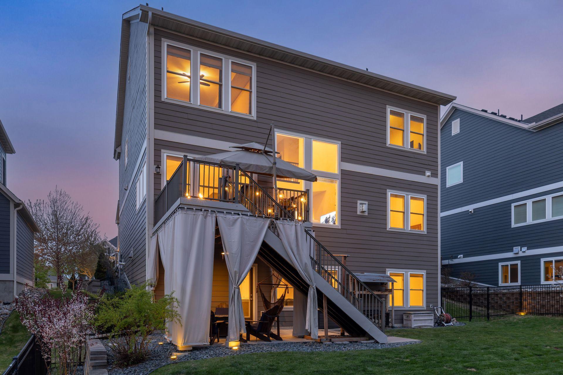 A good look of the back of the home in the evening.