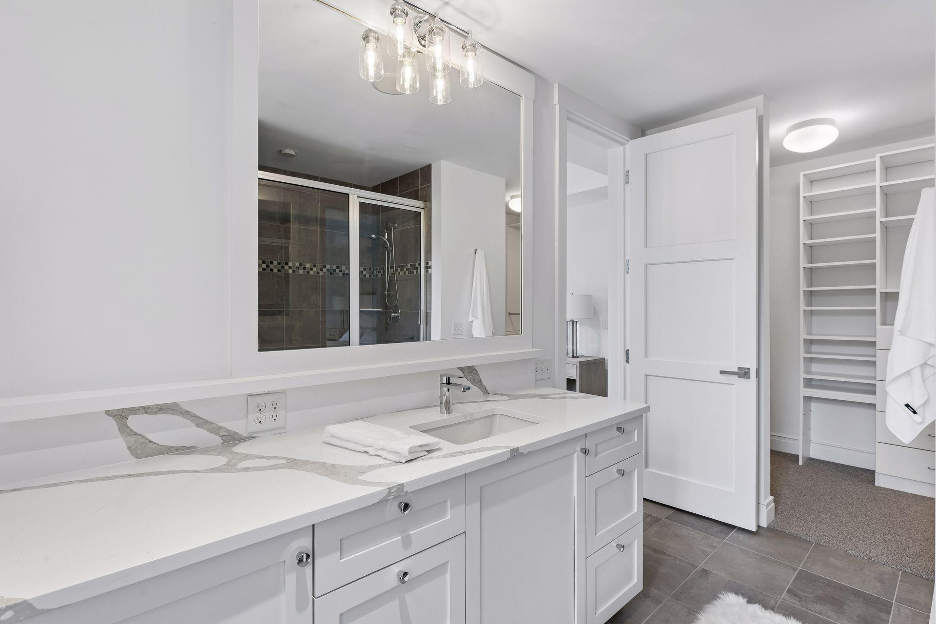 Beautiful new countertops with access to the walk-in closet