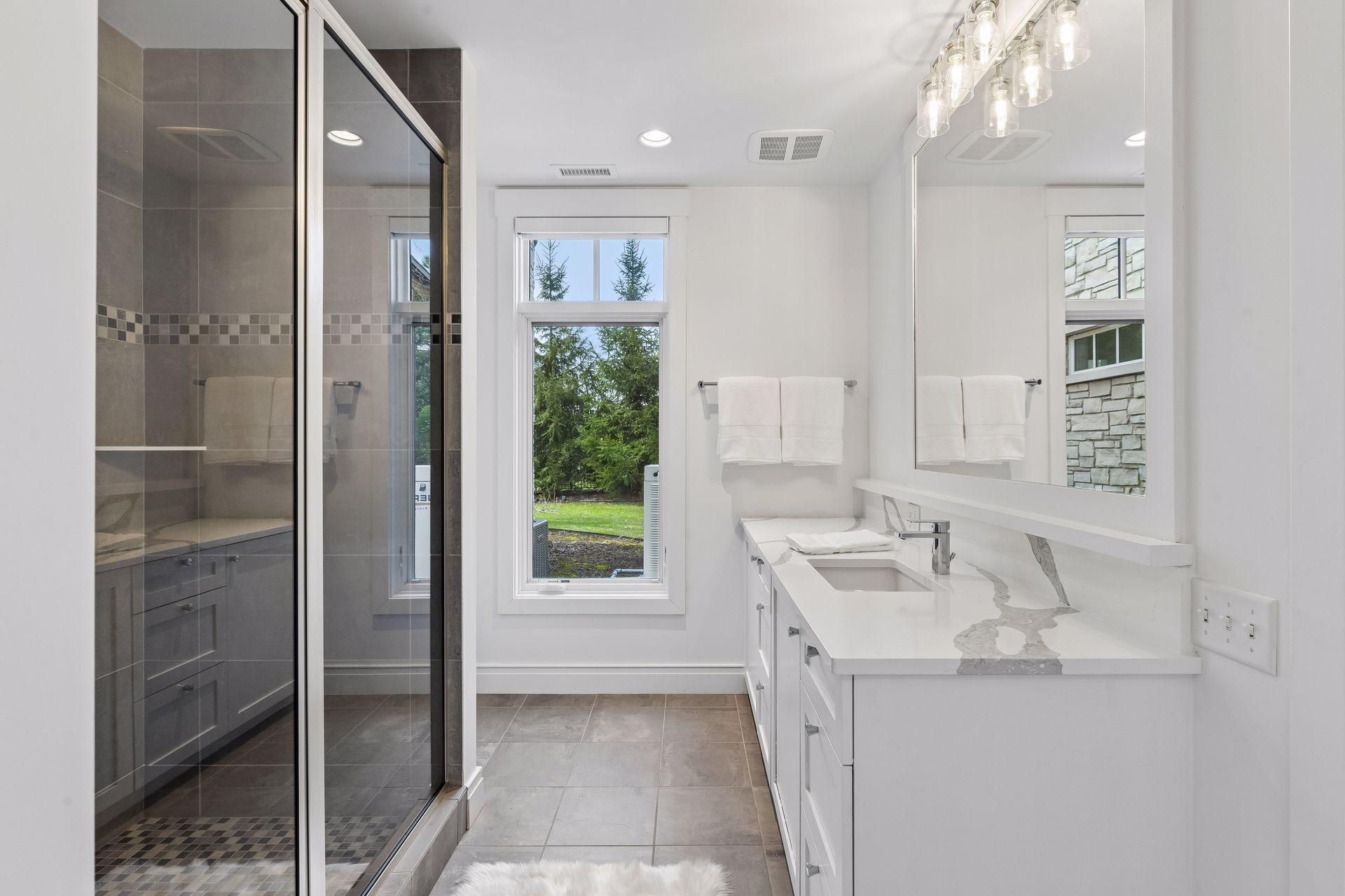 En-suite bathroom in the lower level with a walk-in shower