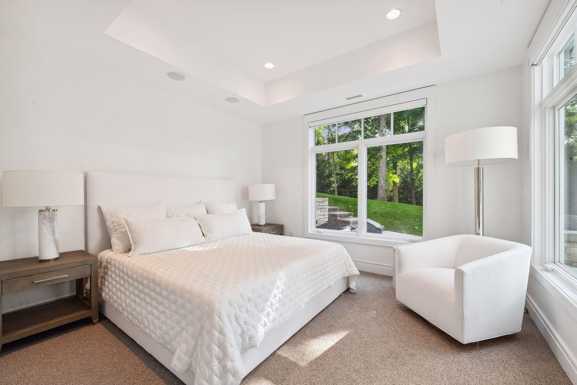 Fifth bedroom located on the lower level with en-suite full bathroom