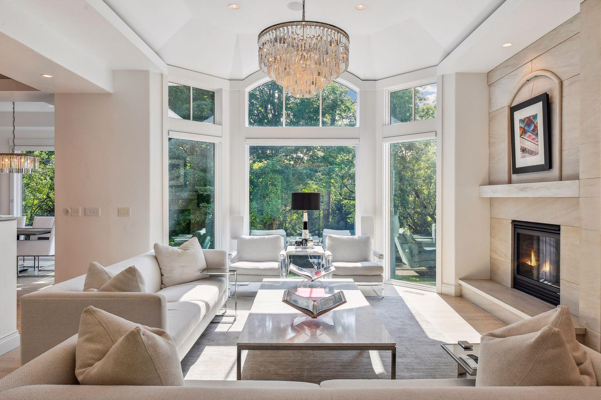 Cozy up by the gas fireplace and enjoy the private views