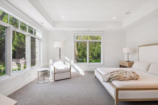 Fourth bedroom located on the lower level with an ensuite 3/4 bathroom