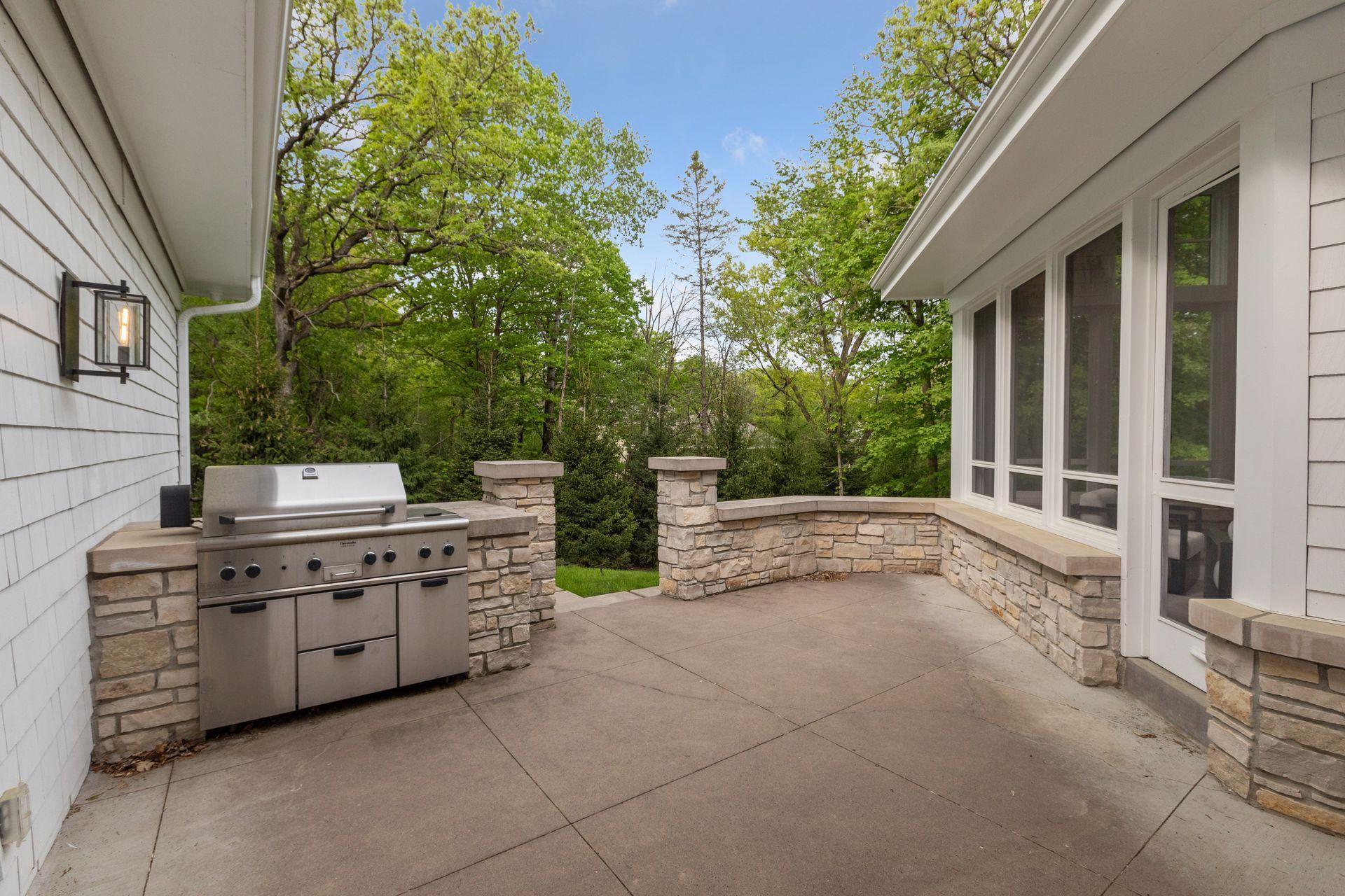 Step out into the patio featuring a built-in grill - ideal for relaxing or hosting