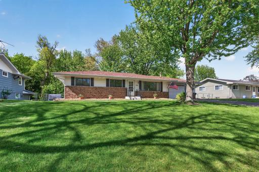 Sharp rambler on 1/4 acre, backs up to wetlands & woods