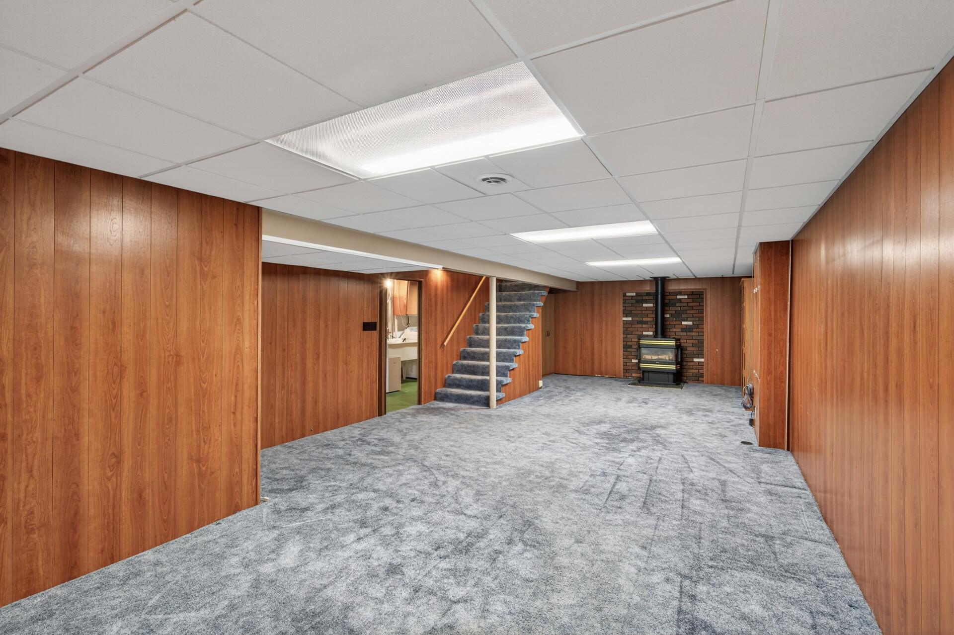 Finished basement features gas fireplace and lots of open space