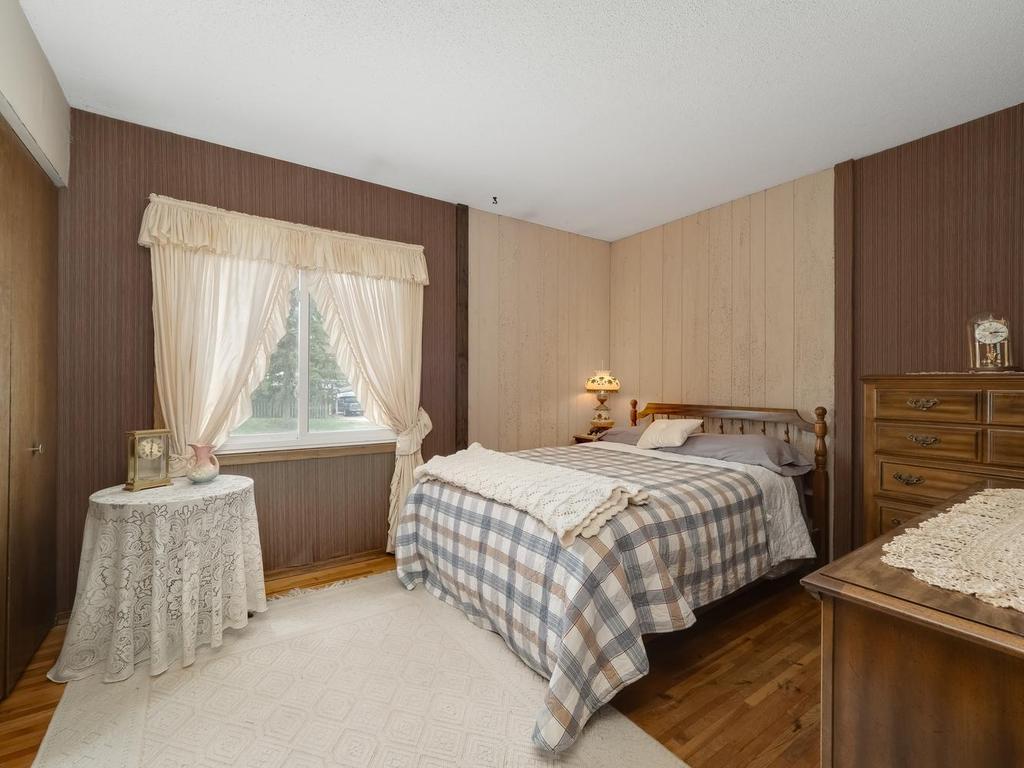 2nd of two main floor bedrooms on main floor with hardwood floor