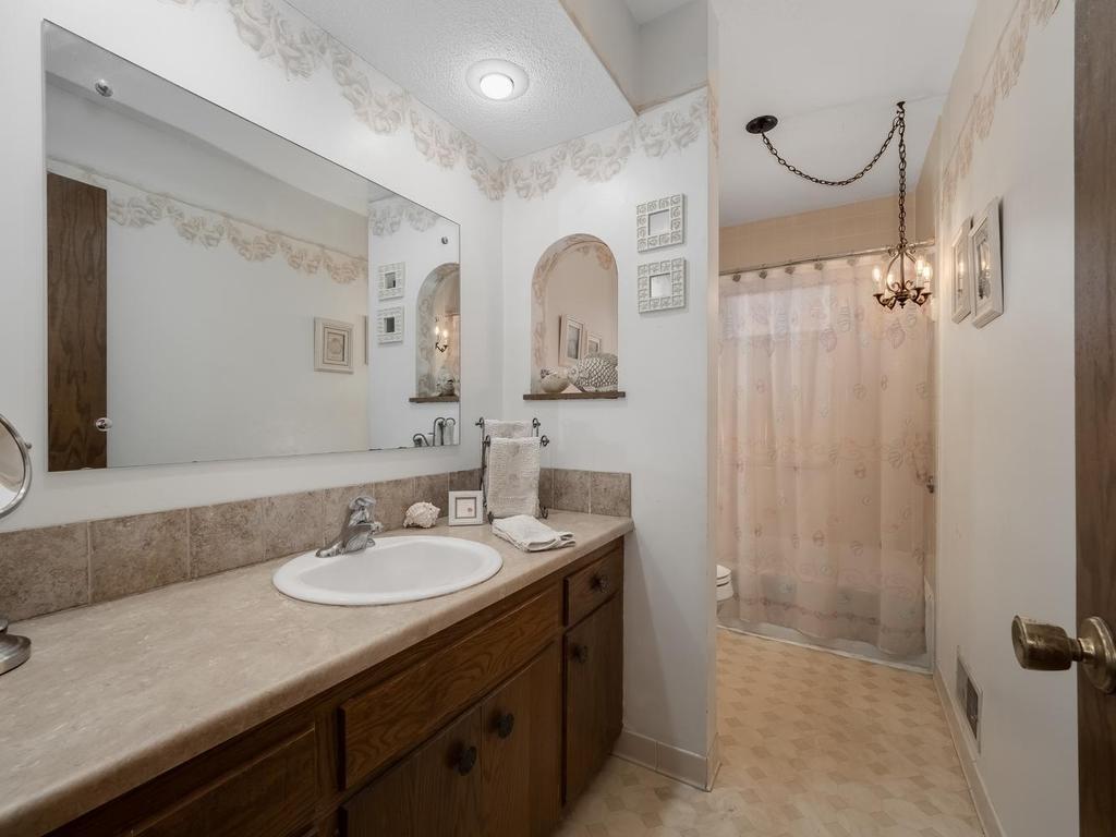 Main floor full bathroom with tub. Plenty of room to change vanity to double sinks