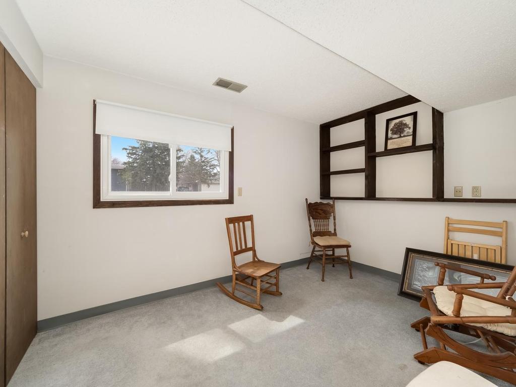 4th bedroom lower level with lookout window formerly used as an office