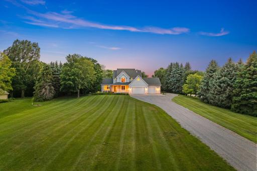 The expansive front yard coupled with the backyard gives you privacy and room to play.