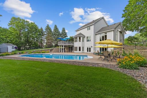 Entertainment deluxe backyard! The expansive cement patio will have ample room for all of your summer fun!